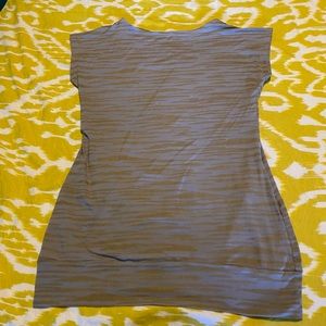 Super flattering, versatile dress that can be worn as a top with leggings